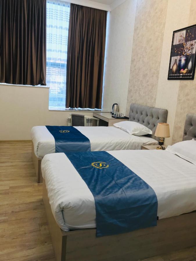 Wantong Hotel Ташкент Екстериор снимка
