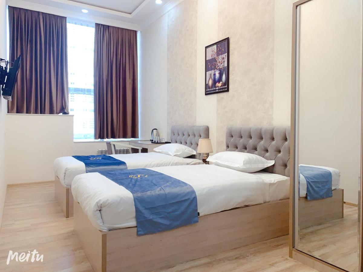 Wantong Hotel Ташкент Екстериор снимка